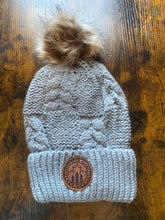 Load image into Gallery viewer, Manitoulin Island Lake Huron knit hat with patch and Pom
